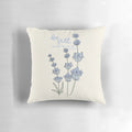 Blue and white hydrangea flowers with the Bible verse "Be still, and know that I am God" from Psalm 46:10 printed on a white pillow.