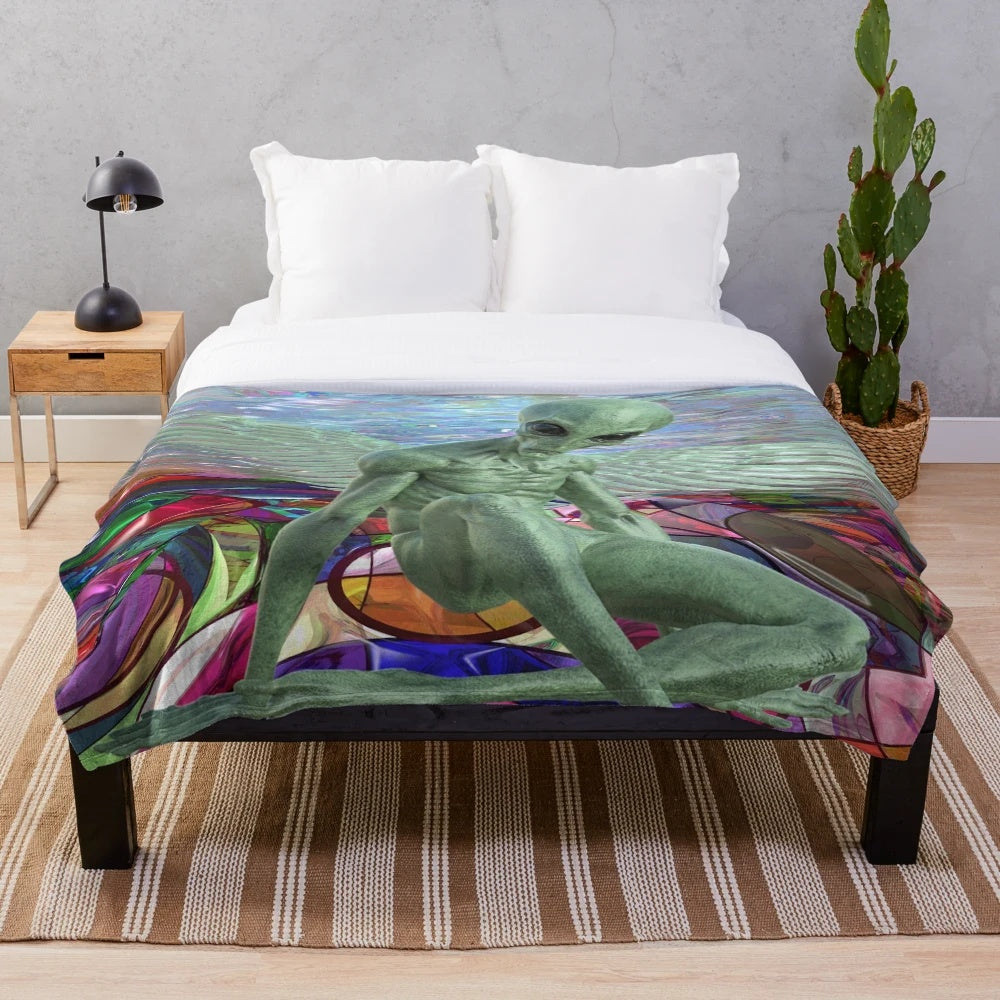 Colorful psychedelic plush blanket featuring an alien with wings in a trippy, boho design