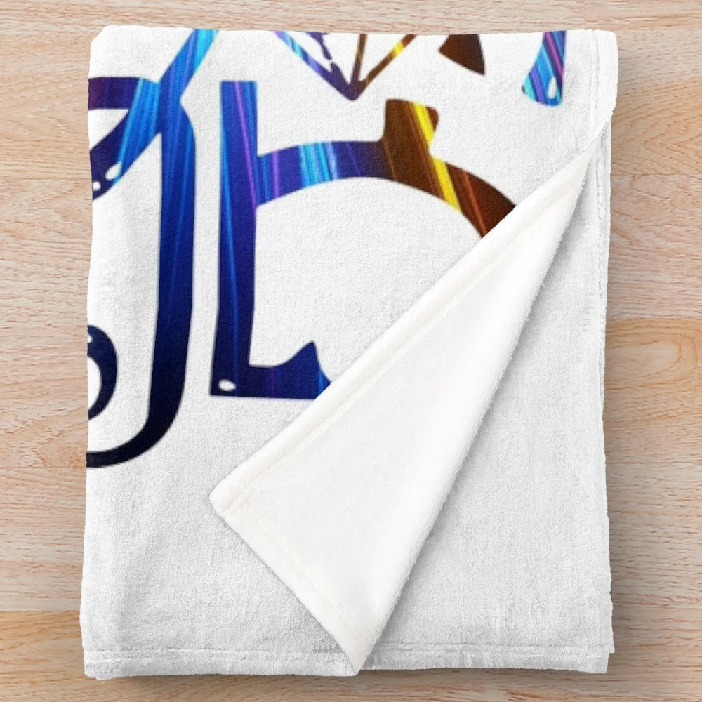 Vibrant and hypnotic psychedelic plush blanket with abstract cosmic and space-themed design