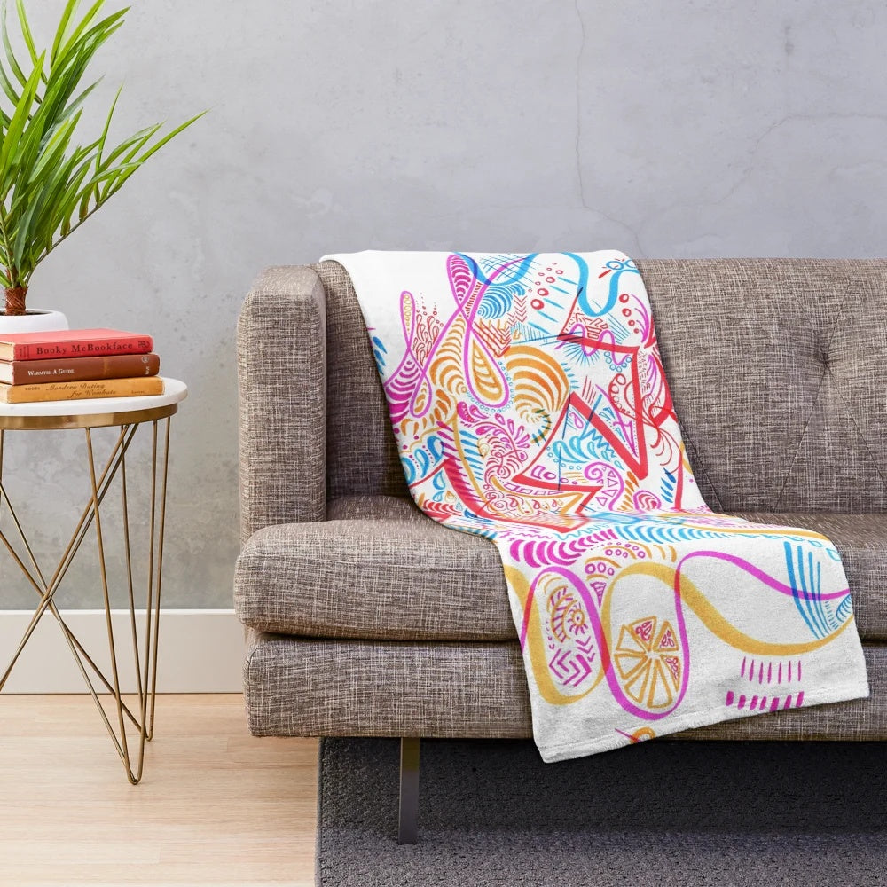 Synesthetic plush blanket with a trippy, psychedelic-inspired doodle design