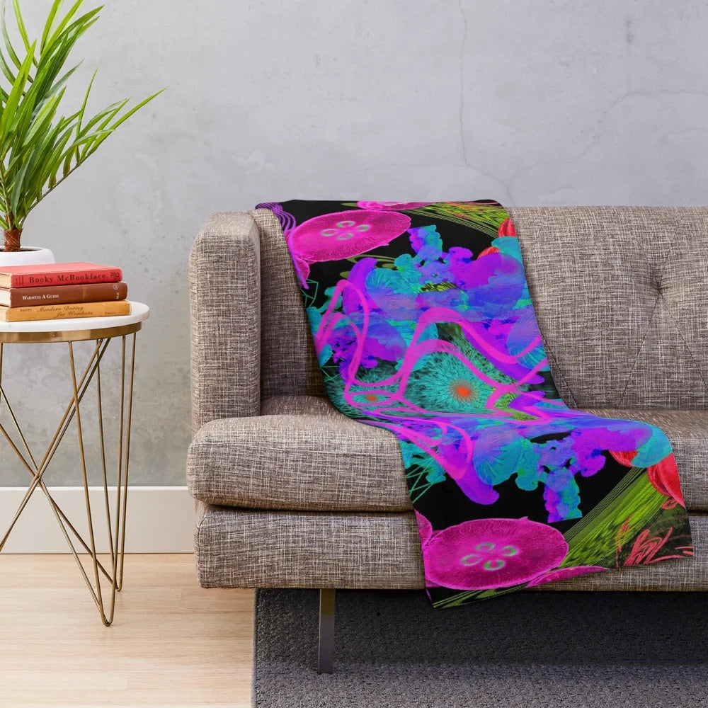 Psychedelic jellyfish-inspired plush blanket with blacklight reactive design