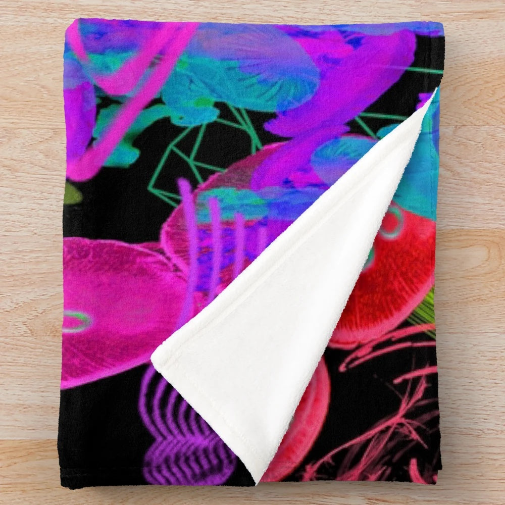 Psychedelic jellyfish-inspired plush blanket with blacklight reactive design