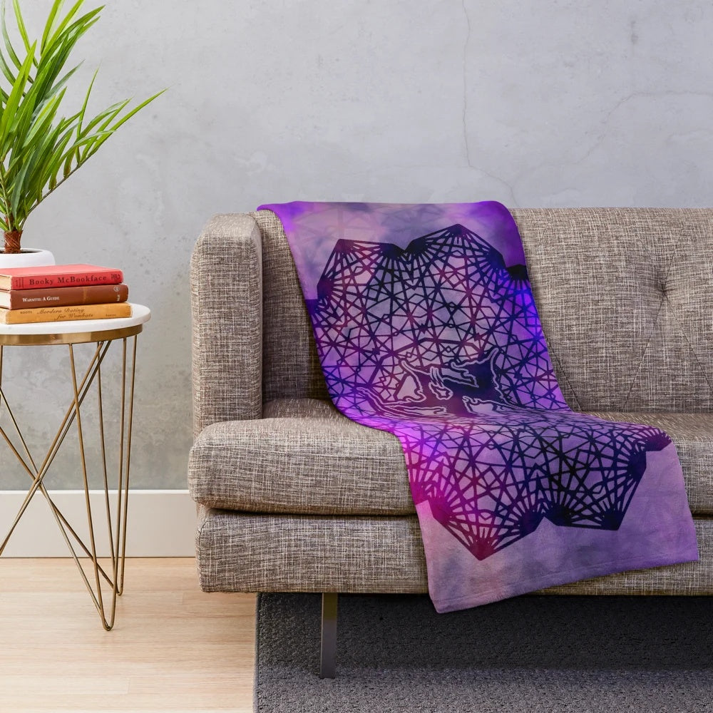 Soft, plush blanket with a vibrant mandala design, perfect for festival and rave attire