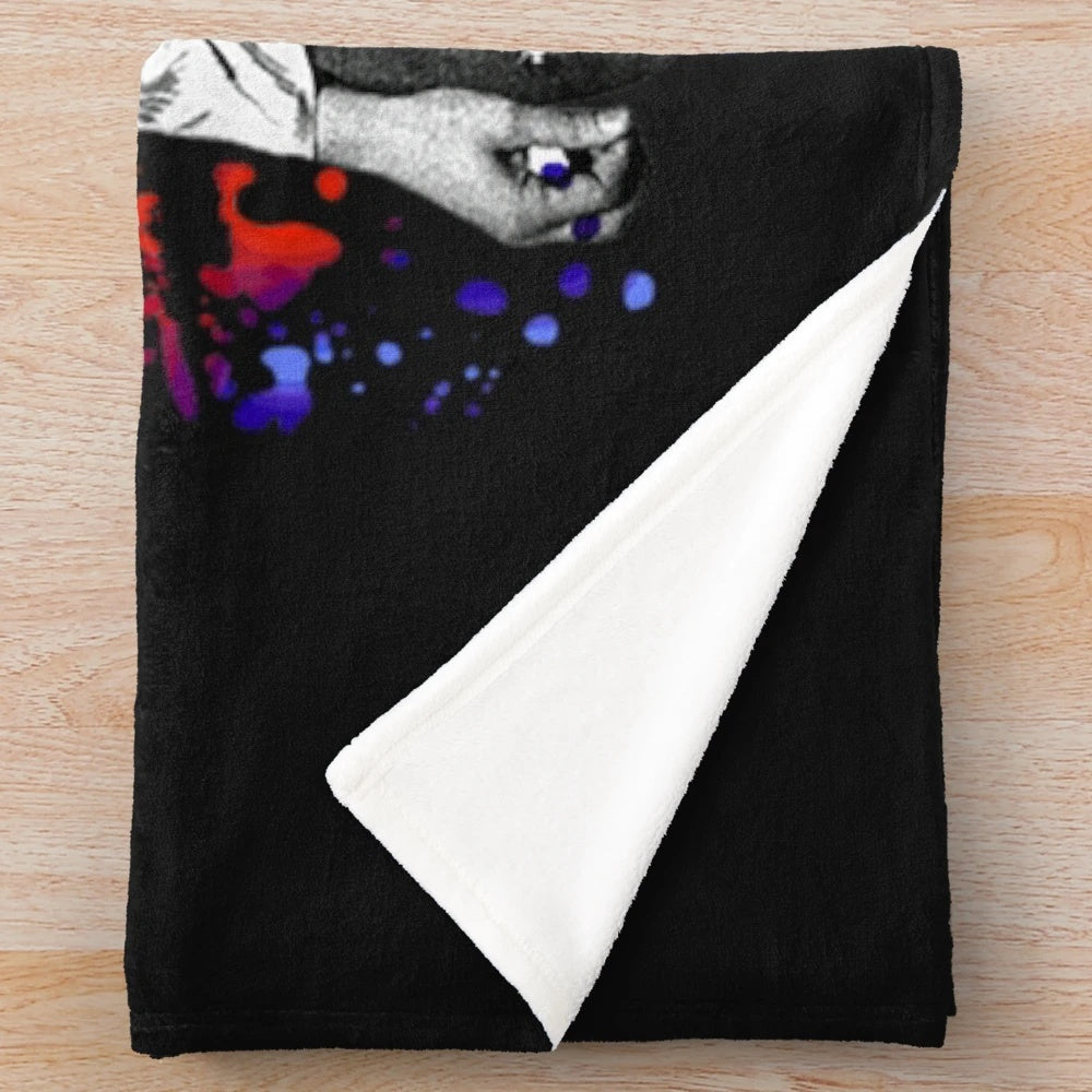 Vibrant paint splatter plush blanket featuring the iconic T. Rex frontman Marc Bolan
