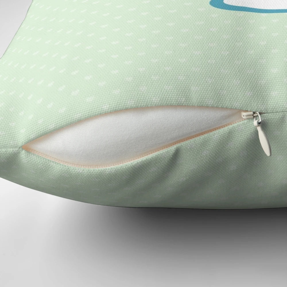 Whimsical green polka dotted mushroom-shaped pillow for kids' room