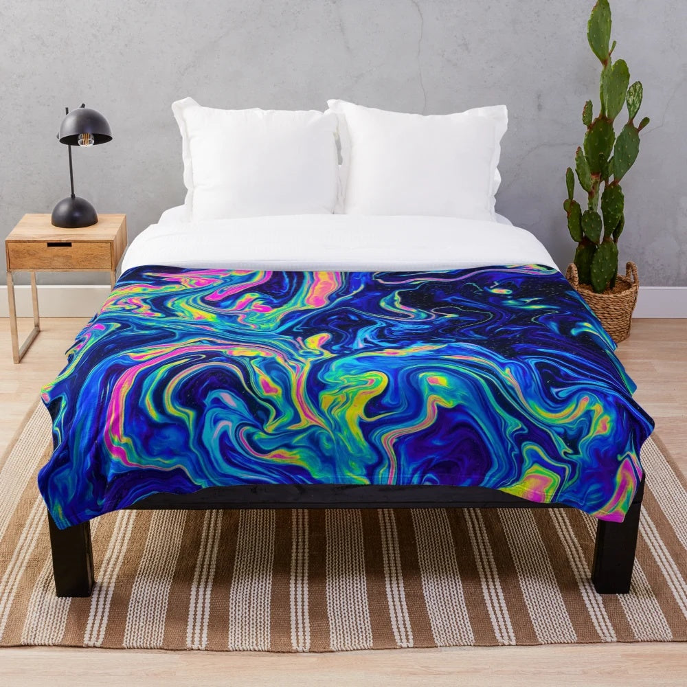 Psychedelic plush blanket with abstract, fluid patterns in vibrant colors
