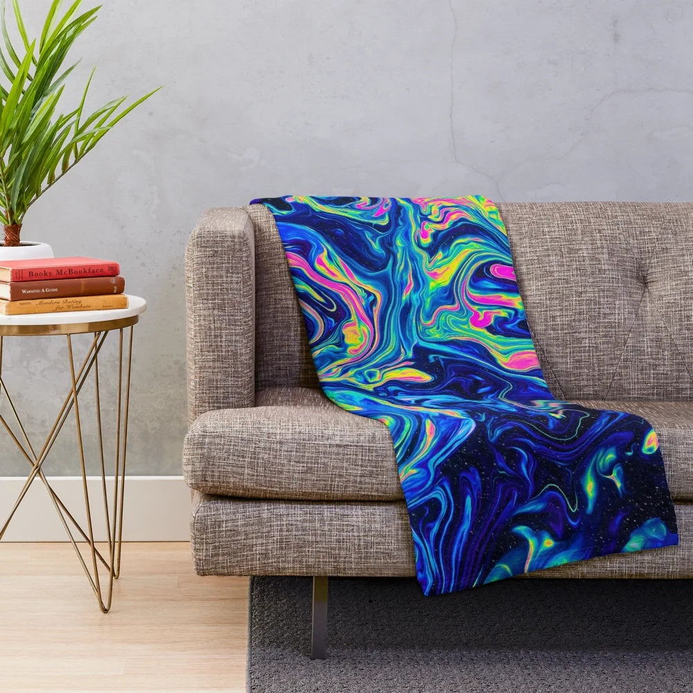 Psychedelic plush blanket with abstract, fluid patterns in vibrant colors