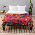 Plush blanket featuring psychedelic album art design