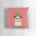Festive pug in a Christmas sweater sitting on a cozy pillow