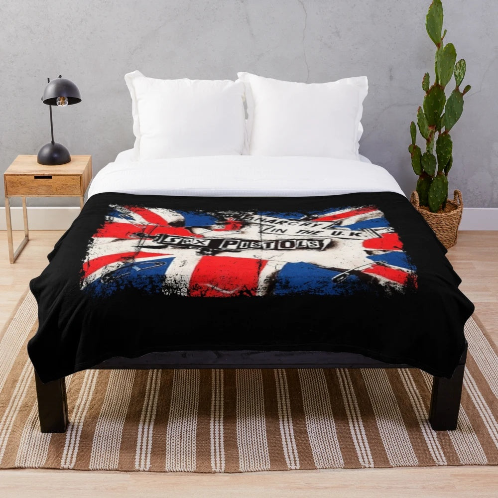 Punk rock-themed plush blanket with 80s punk band logo