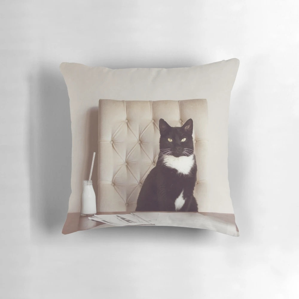 Black cat pillow with the words "Corporate Cat" printed on it