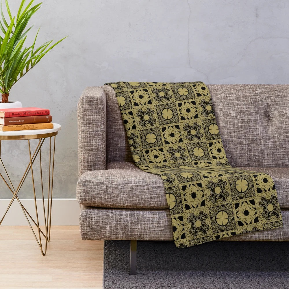 Puzzlebox Pattern Cozy Plush Blanket featuring a horror-inspired design