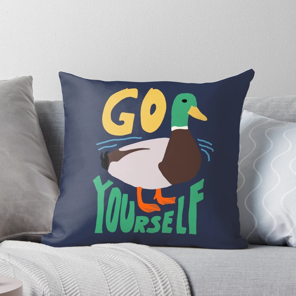 Vibrant and humorous 'Go Duck Yourself' pillow featuring a playful duck illustration