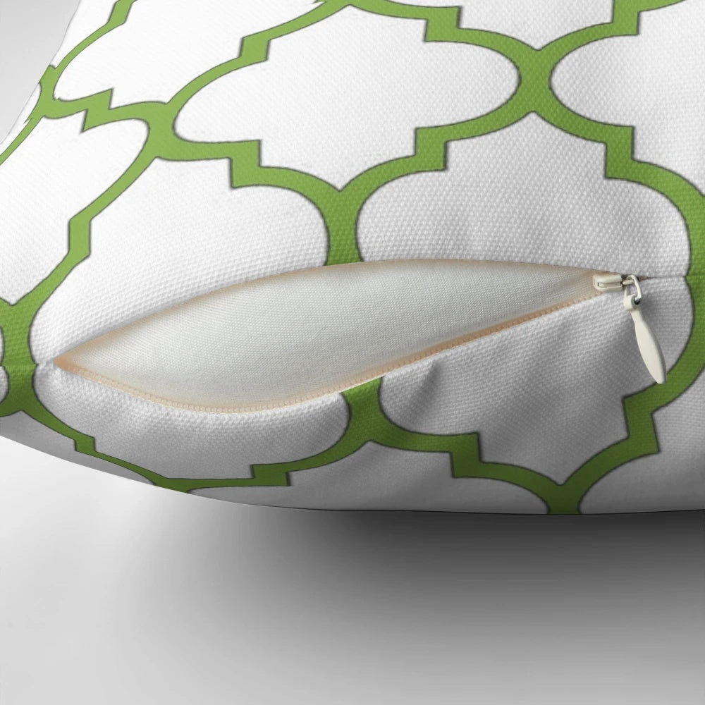 Decorative pillow with a quatrefoil and geometric pattern in the Pantone Color of the Year 2017, Greenery.