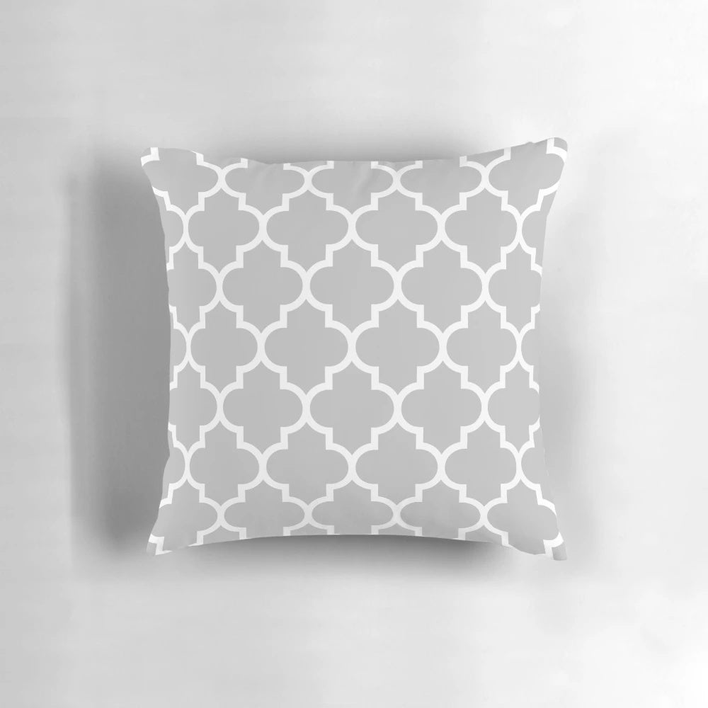 Quatrefoil patterned decorative pillow in silver gray