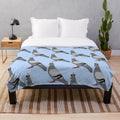Queen plush pigeon blanket with a crown design