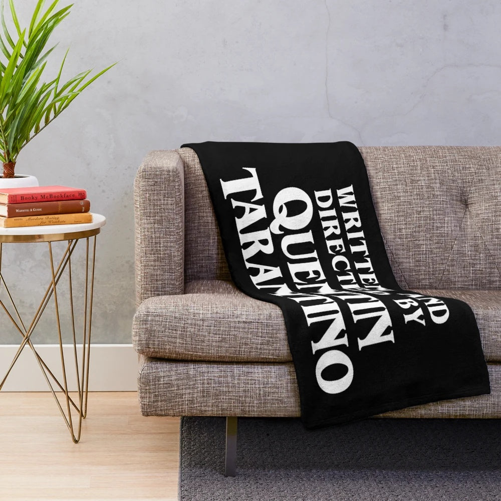 Quentin Tarantino-inspired plush blanket with black and white movie-themed design
