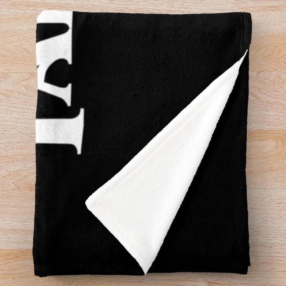 Quentin Tarantino-inspired plush blanket with black and white movie-themed design