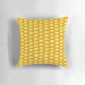 Corn cob patterned pillow with a fun, playful design for adding a touch of rustic charm to any room.