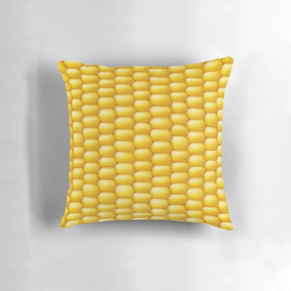 Corn cob patterned pillow with a fun, playful design for adding a touch of rustic charm to any room.