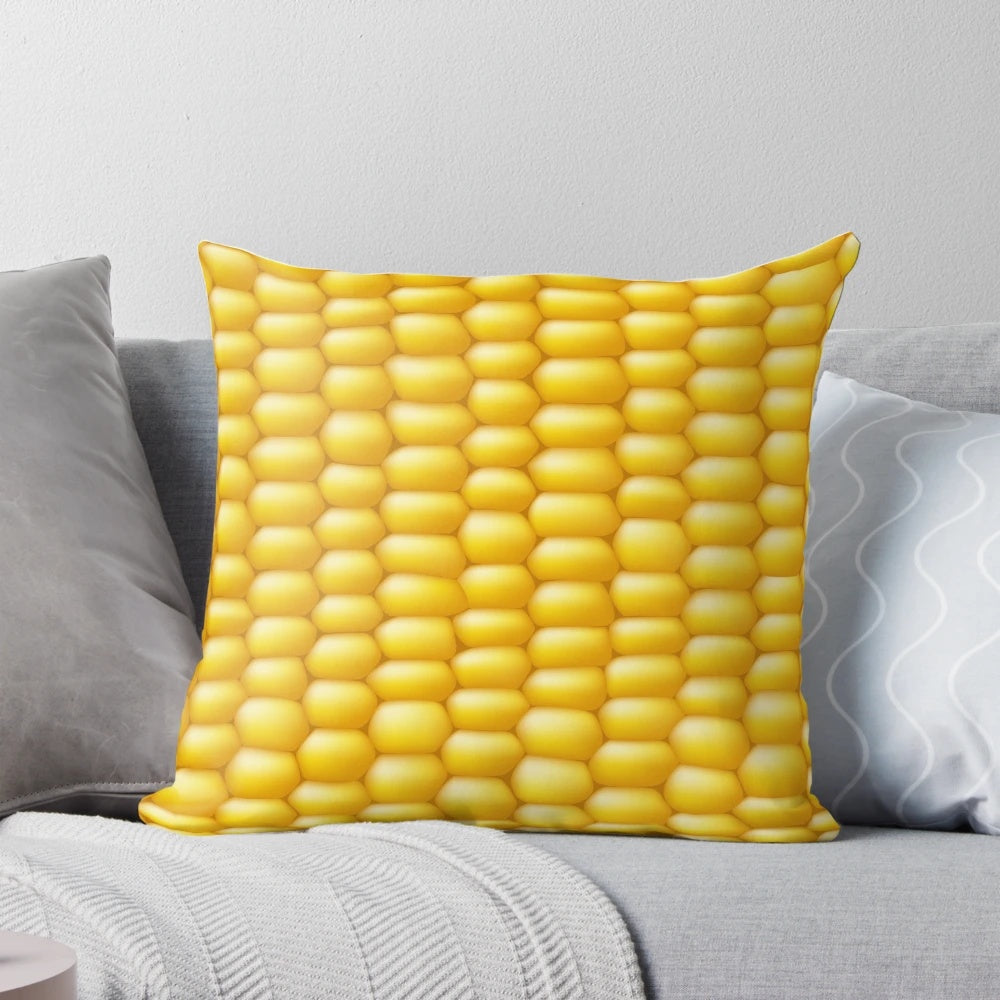 Corn cob patterned pillow with a fun, playful design for adding a touch of rustic charm to any room.