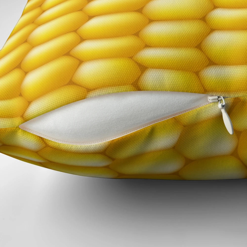 Corn cob patterned pillow with a fun, playful design for adding a touch of rustic charm to any room.