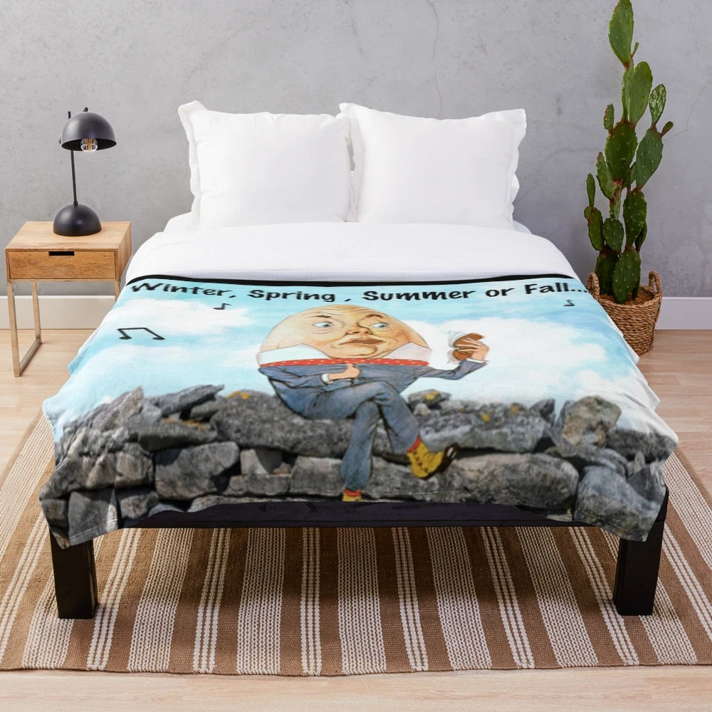 Humpty Dumpty sitting on a wall, singing a whimsical nursery rhyme, printed on a plush blanket