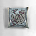 Whimsical illustration of a glass of water with the text "I don't drink water" printed on a decorative throw pillow.