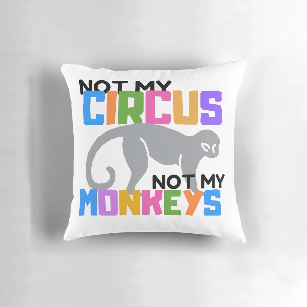 Whimsical "Not My Circus" throw pillow featuring a monkey design, perfect for circus-themed home decor.