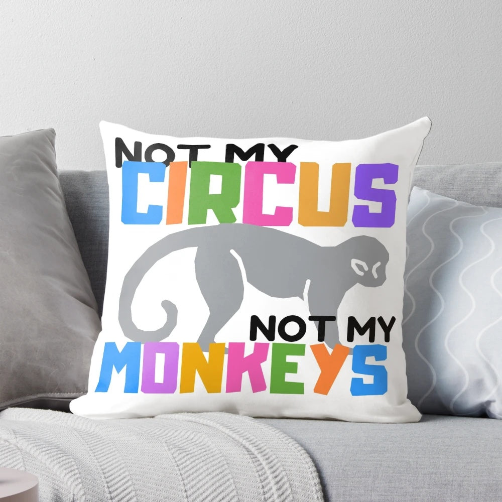 Whimsical "Not My Circus" throw pillow featuring a monkey design, perfect for circus-themed home decor.