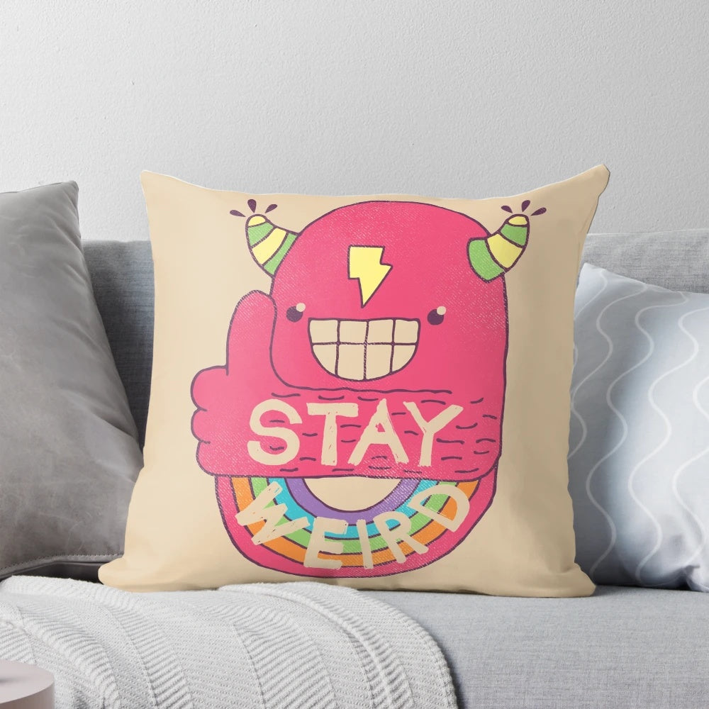 Colorful and whimsical "Stay Weird!" throw pillow with a bold, retro-inspired design