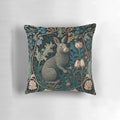 Decorative pillow featuring a rabbit in a forest, inspired by the artistic style of William Morris.