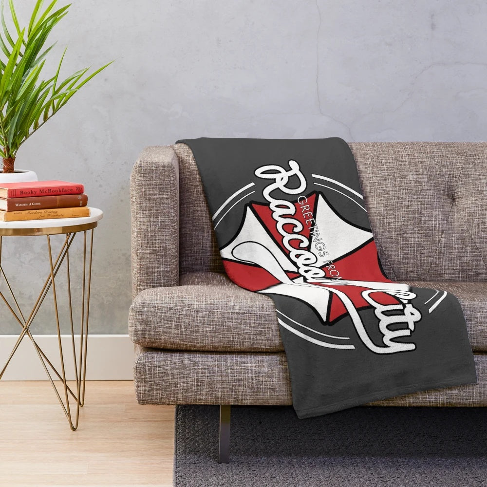 Raccoon City themed plush blanket featuring iconic video game horror imagery