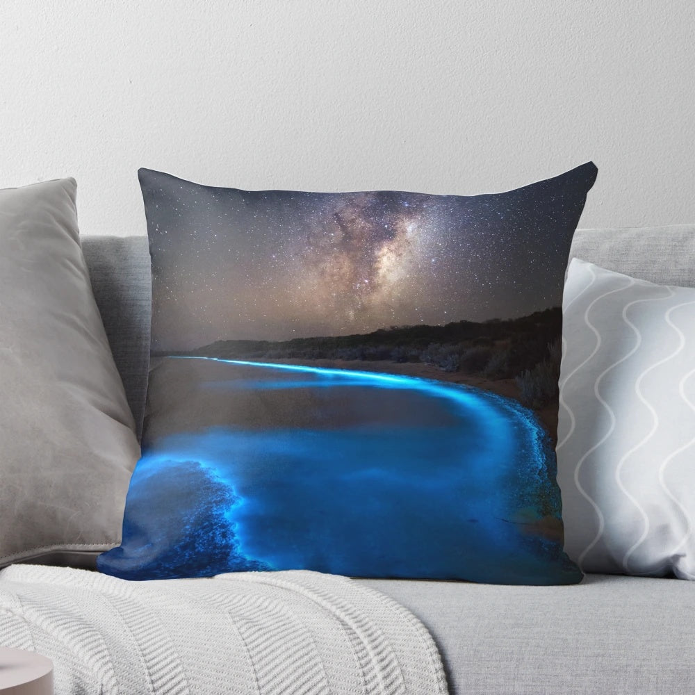Glowing pillow with bioluminescent design inspired by the Milky Way galaxy