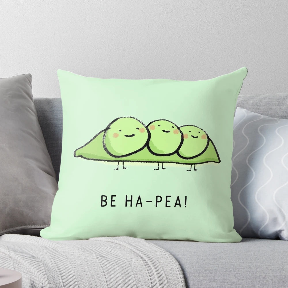 A vibrant and whimsical pillow featuring a cartoon pea character, designed to bring happiness and a positive outlook.