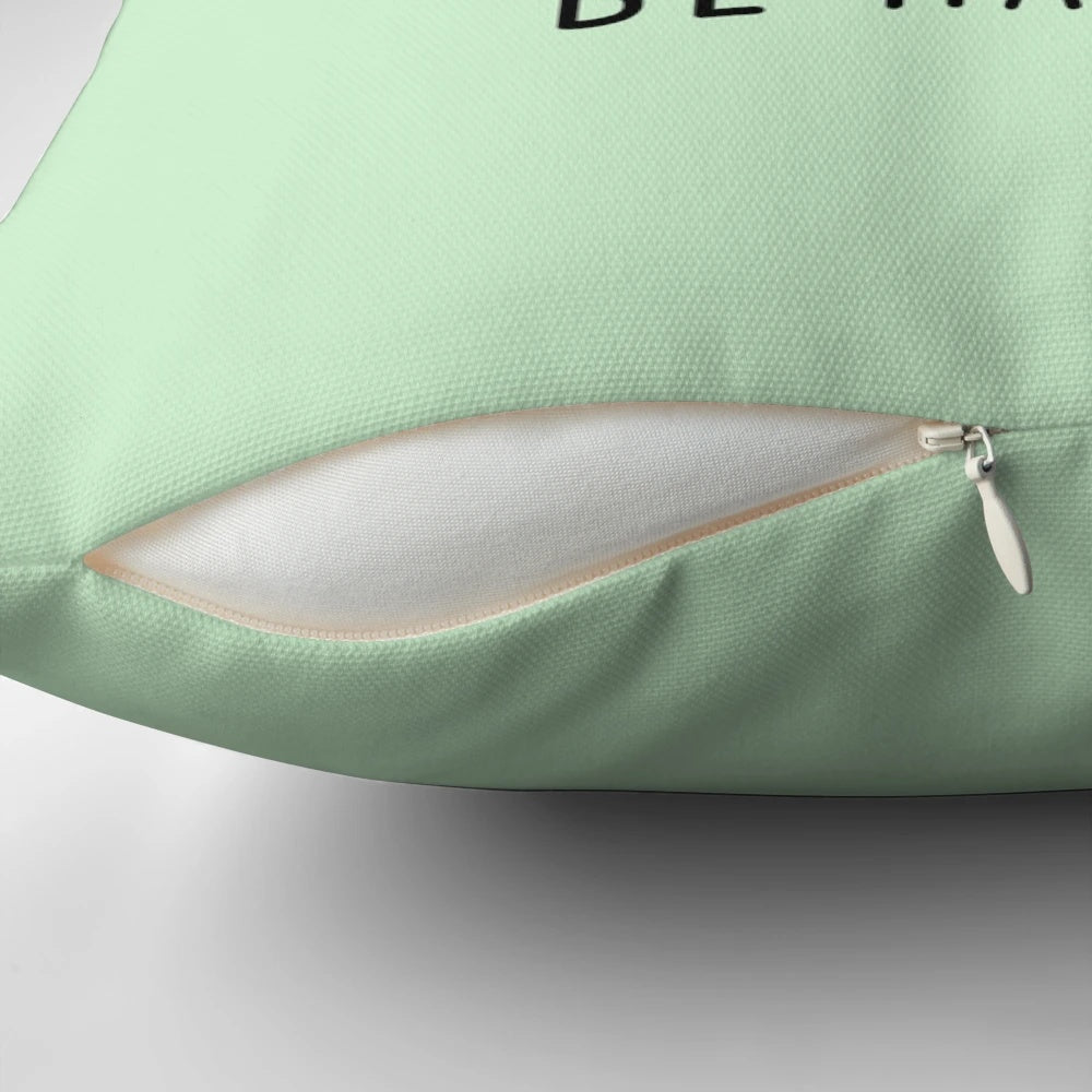 A vibrant and whimsical pillow featuring a cartoon pea character, designed to bring happiness and a positive outlook.