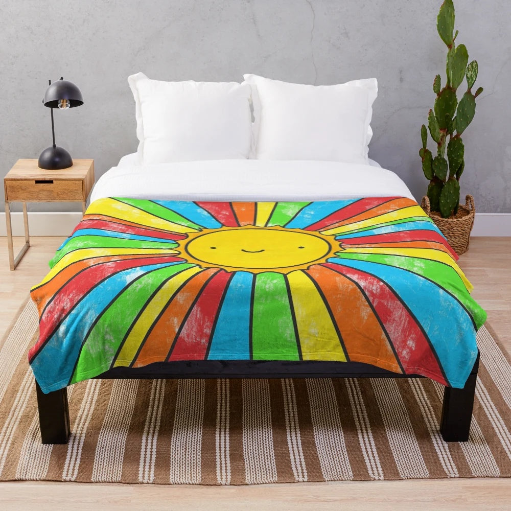 Colorful plush blanket with positive affirmations and vibrant rainbow design