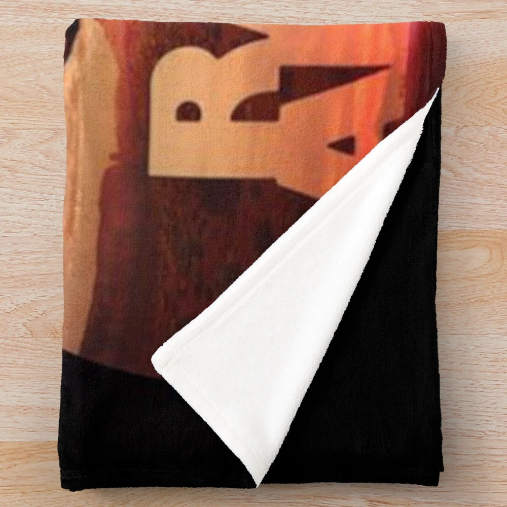 Raising Arizona inspired plush blanket featuring a graphic design of Nicholas Cage