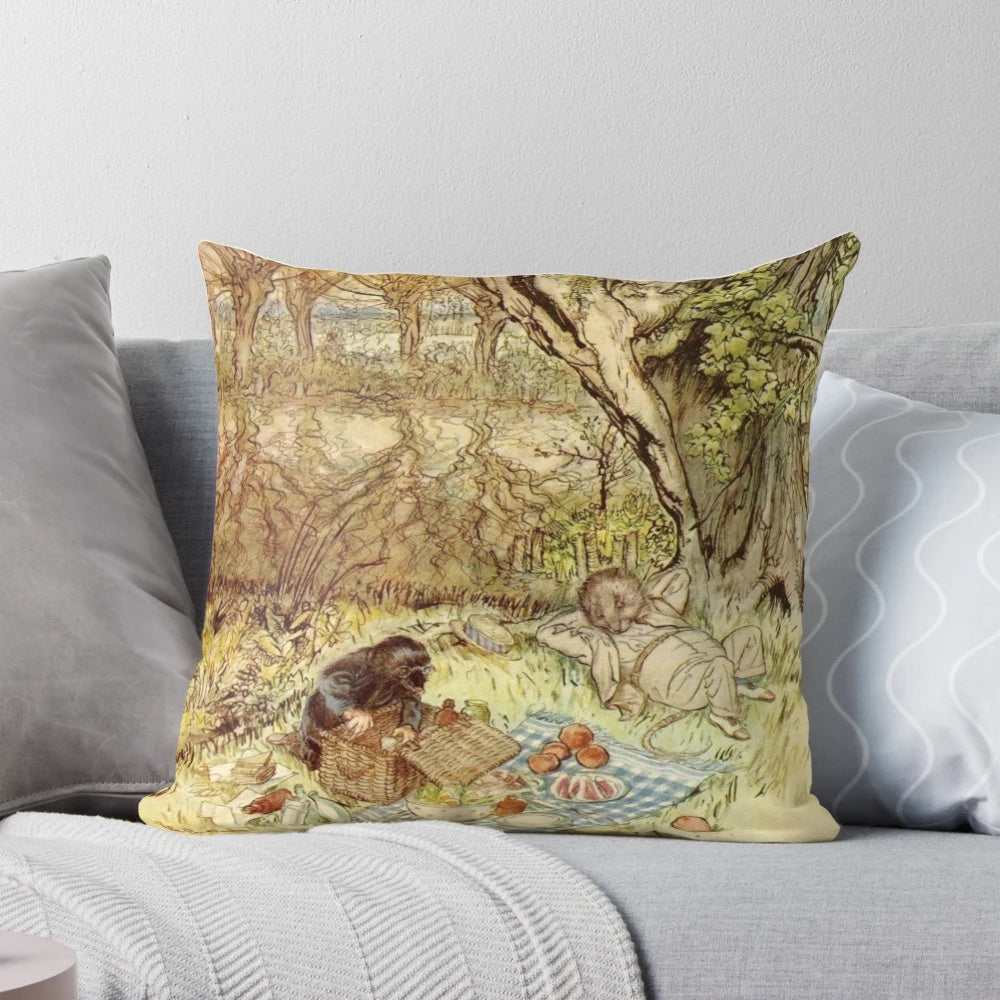 Decorative pillow featuring a classic illustration of Rat and Mole having a picnic from The Wind in the Willows by Arthur Rackham.