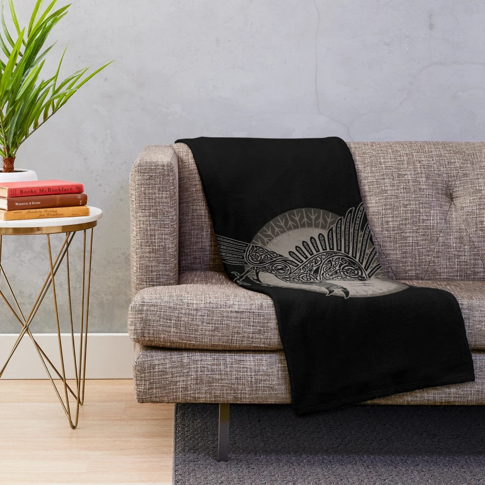 Raven-inspired plush blanket with Scandinavian tribal design