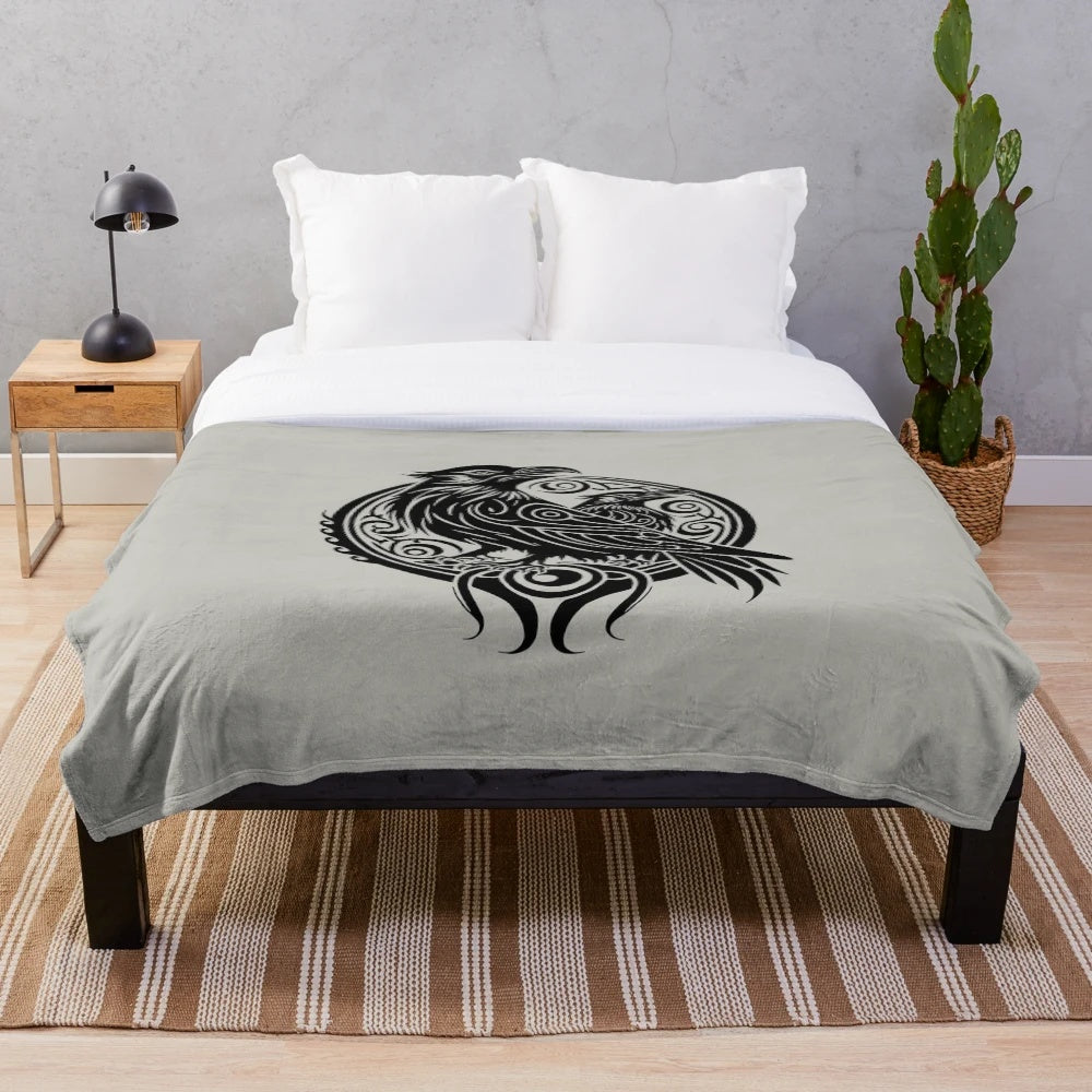 Raven silhouette plush blanket with tribal elements and legendary animal design