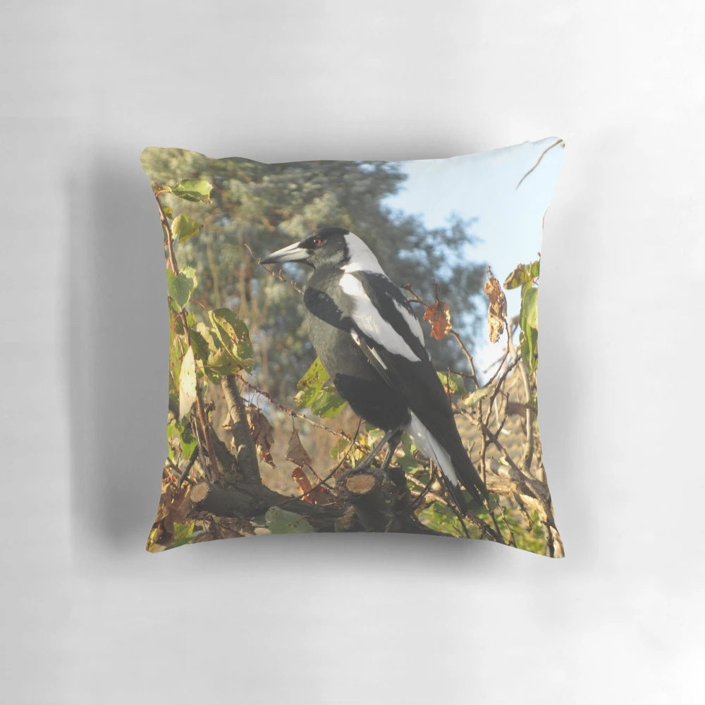 Close-up image of a beautiful male Australian magpie printed on a soft, comfortable pillow.