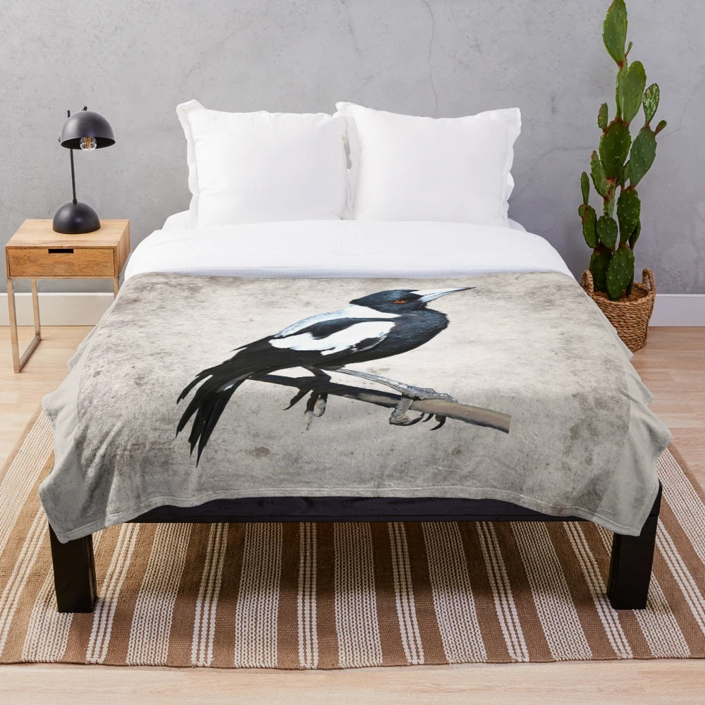 Cozy plush blanket featuring a realistic Australian magpie design