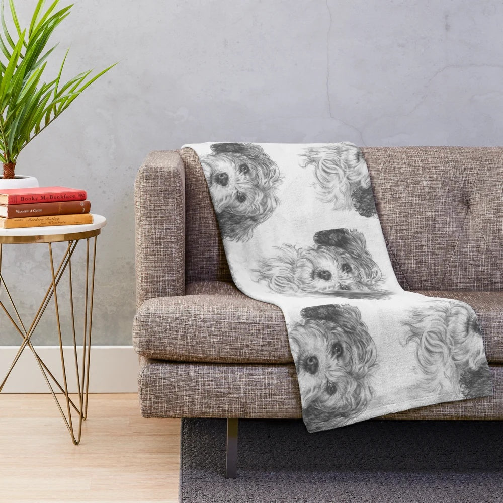 Realistic Bichon Cavalier pet portrait on a plush blanket