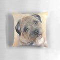 A realistic border terrier dog portrait painting on a decorative throw pillow.