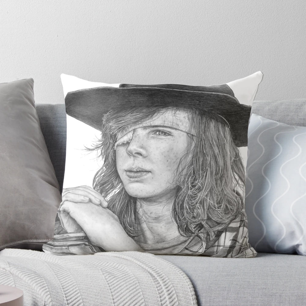 Detailed graphite portrait of Carl Grimes from The Walking Dead TV show printed on a cozy pillow