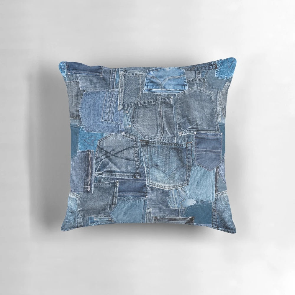 Photograph of a close-up view of a distressed and washed denim jeans pocket with a patchwork pattern, perfect for design projects.