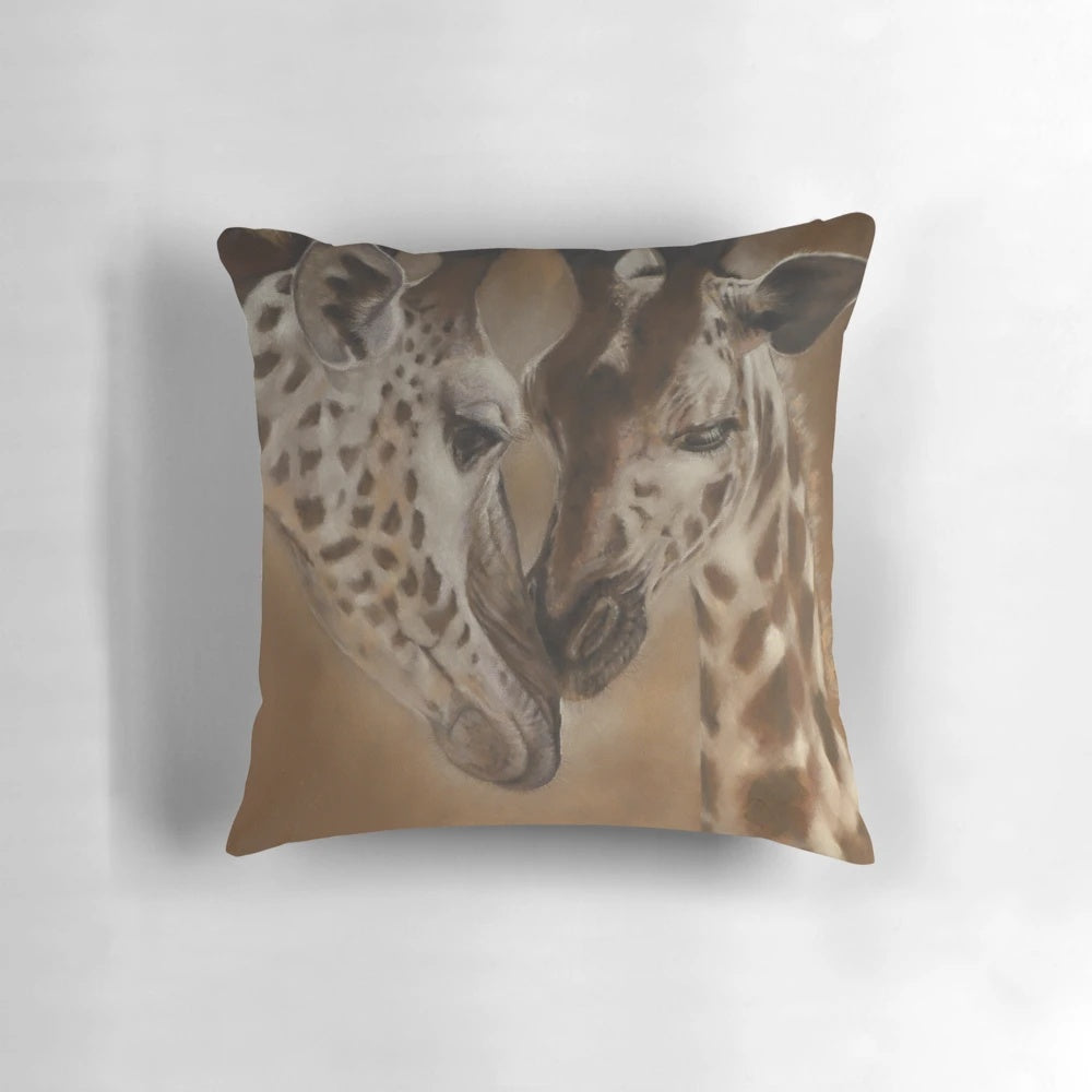 Closeup of a detailed giraffe illustration printed on a plush throw pillow
