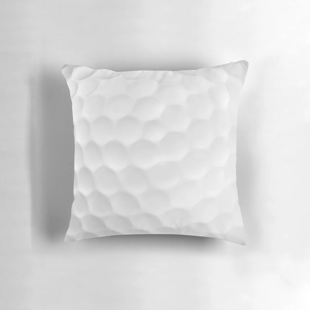 Soft, white golf ball shaped throw pillow for golf home decor