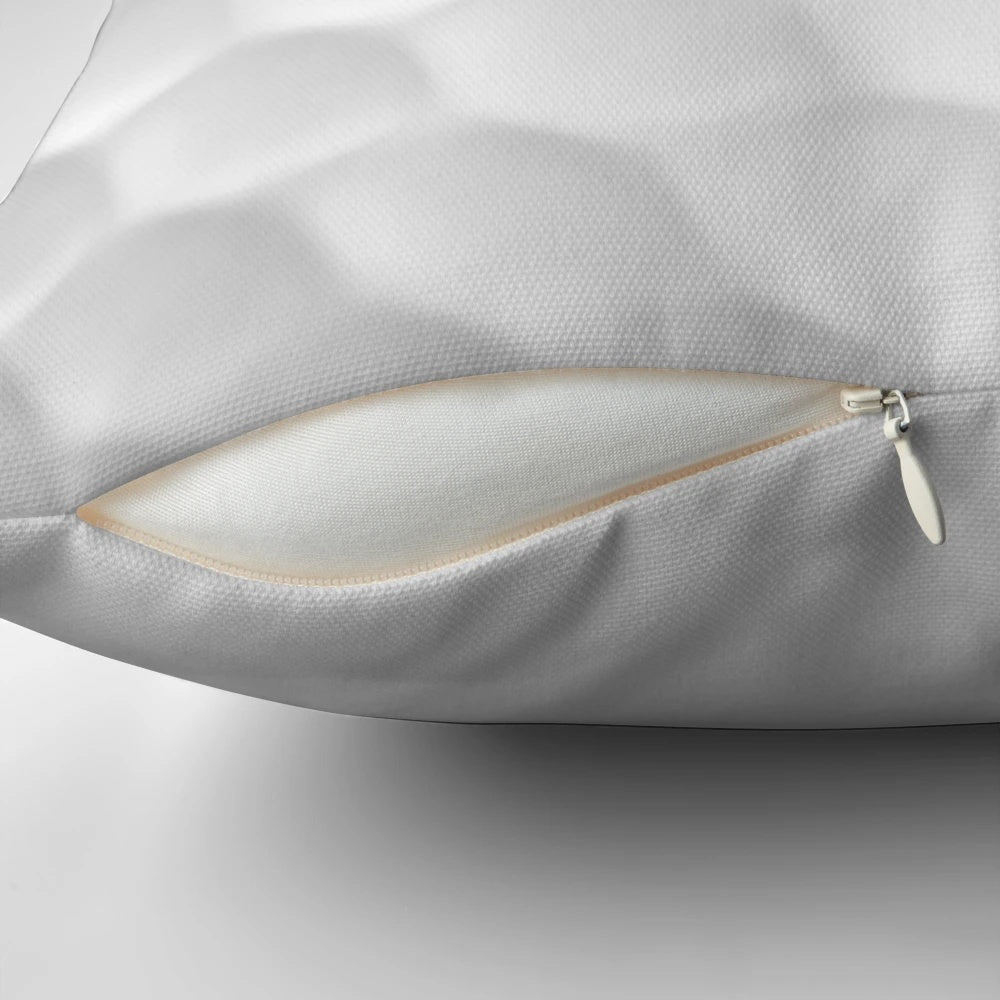 Soft, white golf ball shaped throw pillow for golf home decor